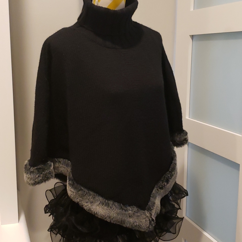 Faux fur trimmed knit poncho